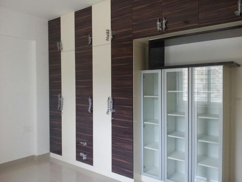 Wardrobe with book rack.